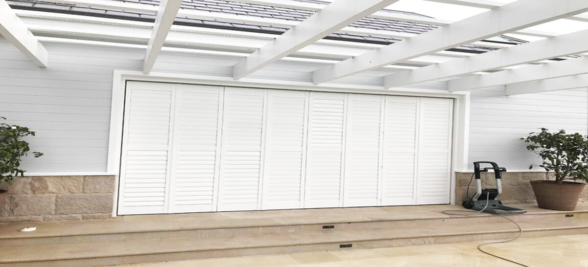 Living Room with White Timber Shutters