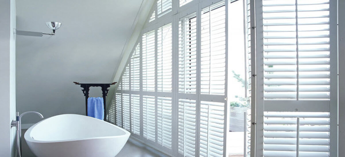 White Plantation Shutters in Bathroom