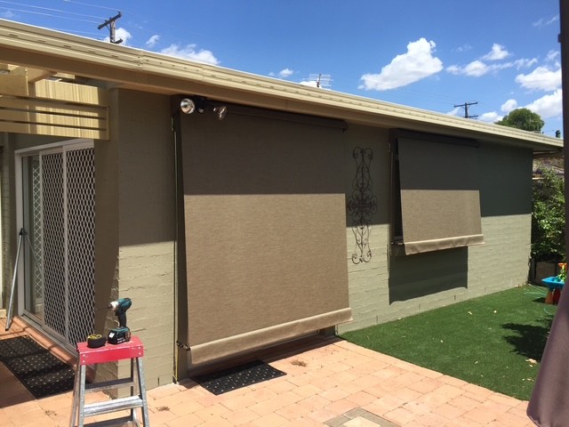 Exterior awnings installed over windows on a Greater New England home by Apollo Blinds Tamworth.